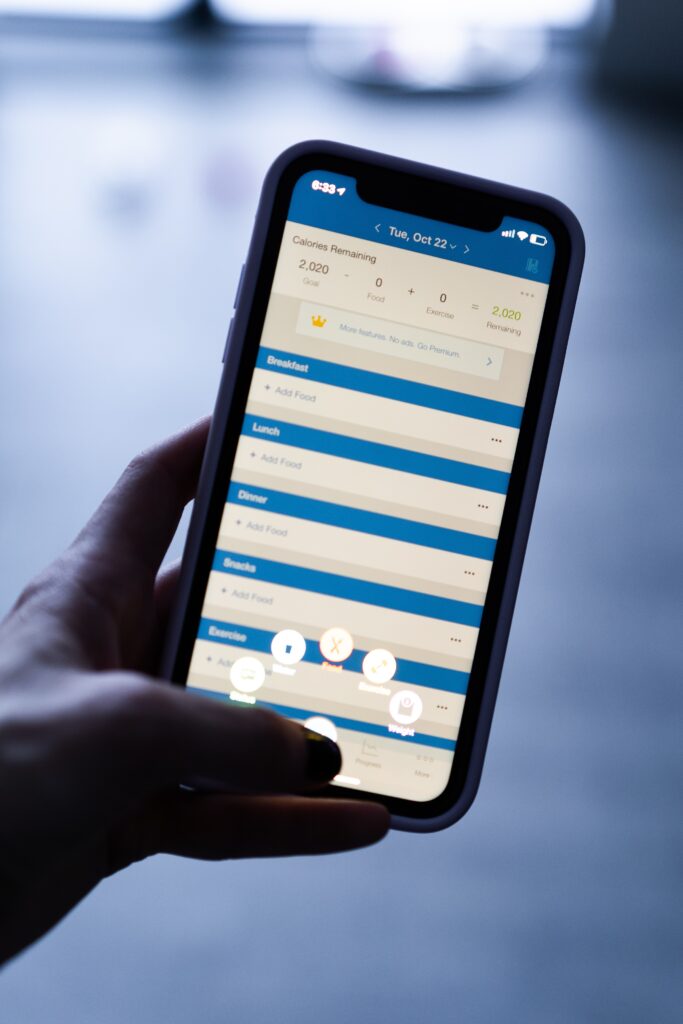 smartphone with MyFitnessPal app on screen