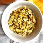 bowl of pumpkin seeds with everything bagel seasoning