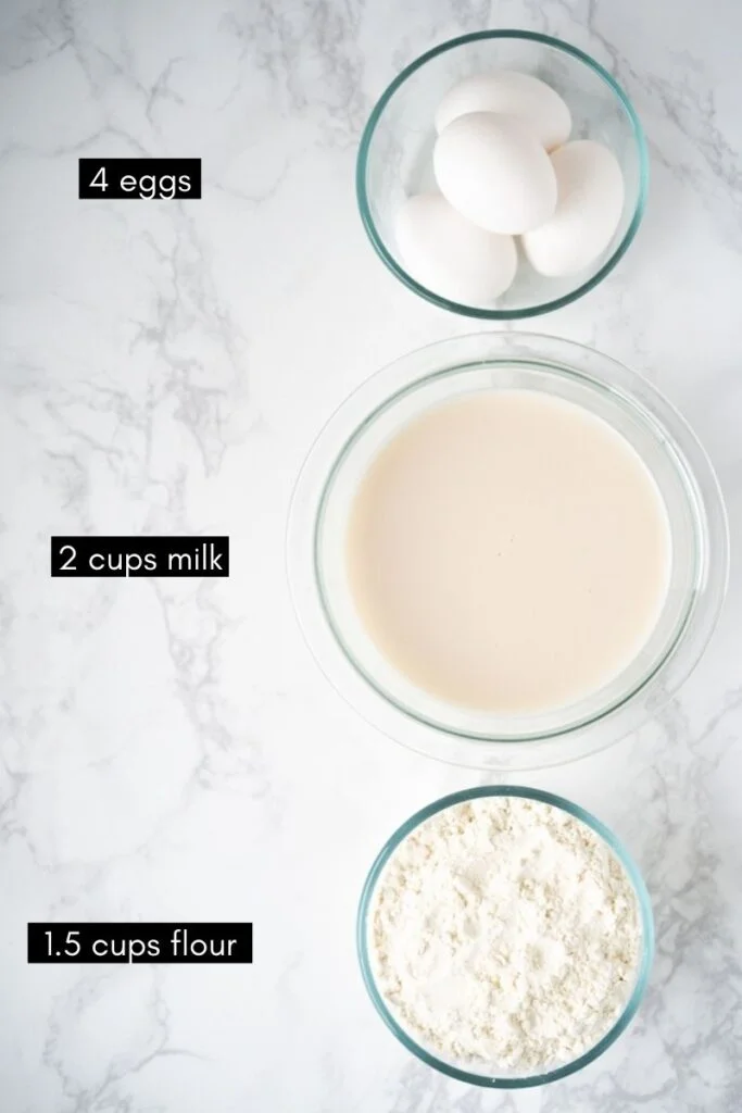 bowls with eggs, milk, and flour