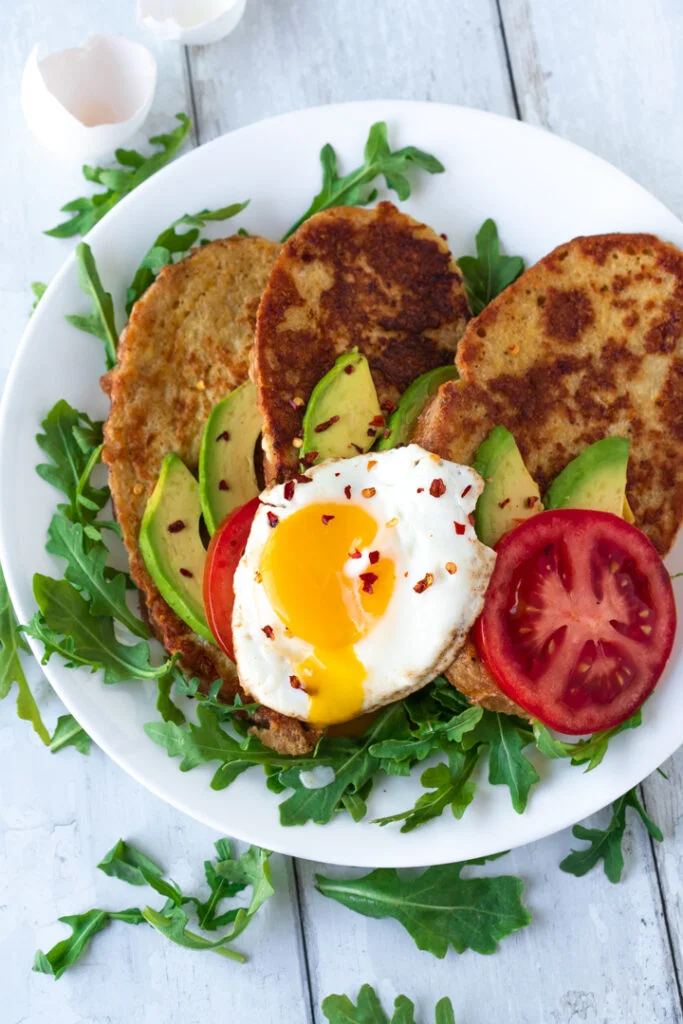 sourdough French toast topped with fried egg