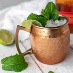copper mug garnished with mint