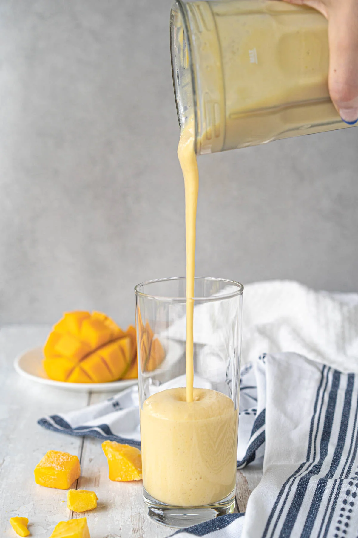pouring shake into a glass