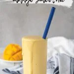 glass overflowing with yellow drink