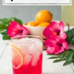 hot pink drink with ice and lemon slices